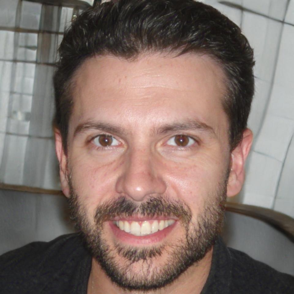 Senior financial analyst reviewing business metrics