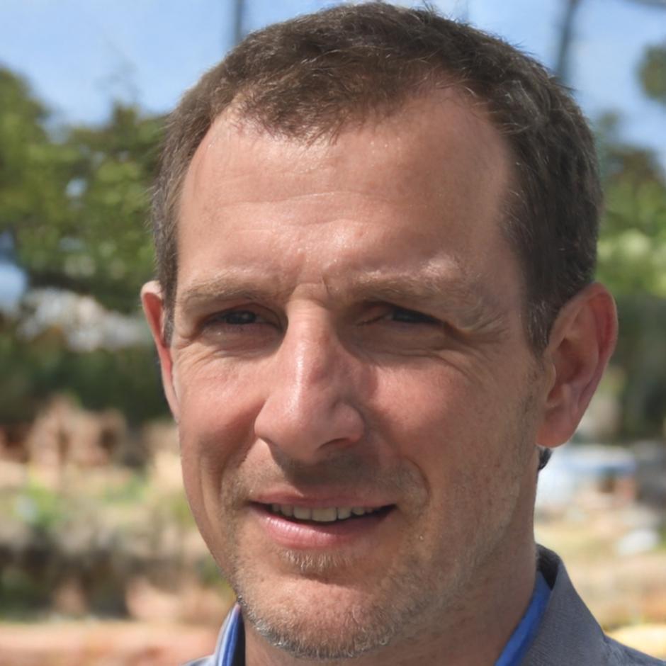 Portrait of Dmitri Kowalczyk, senior finance instructor